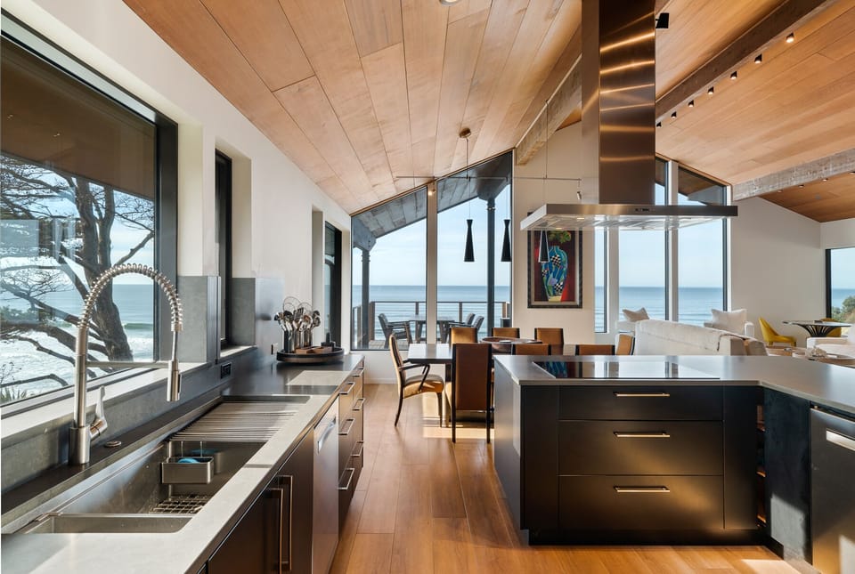 State of the art kitchen with induction cooktop; 2 large sinks and 2 dishwashers