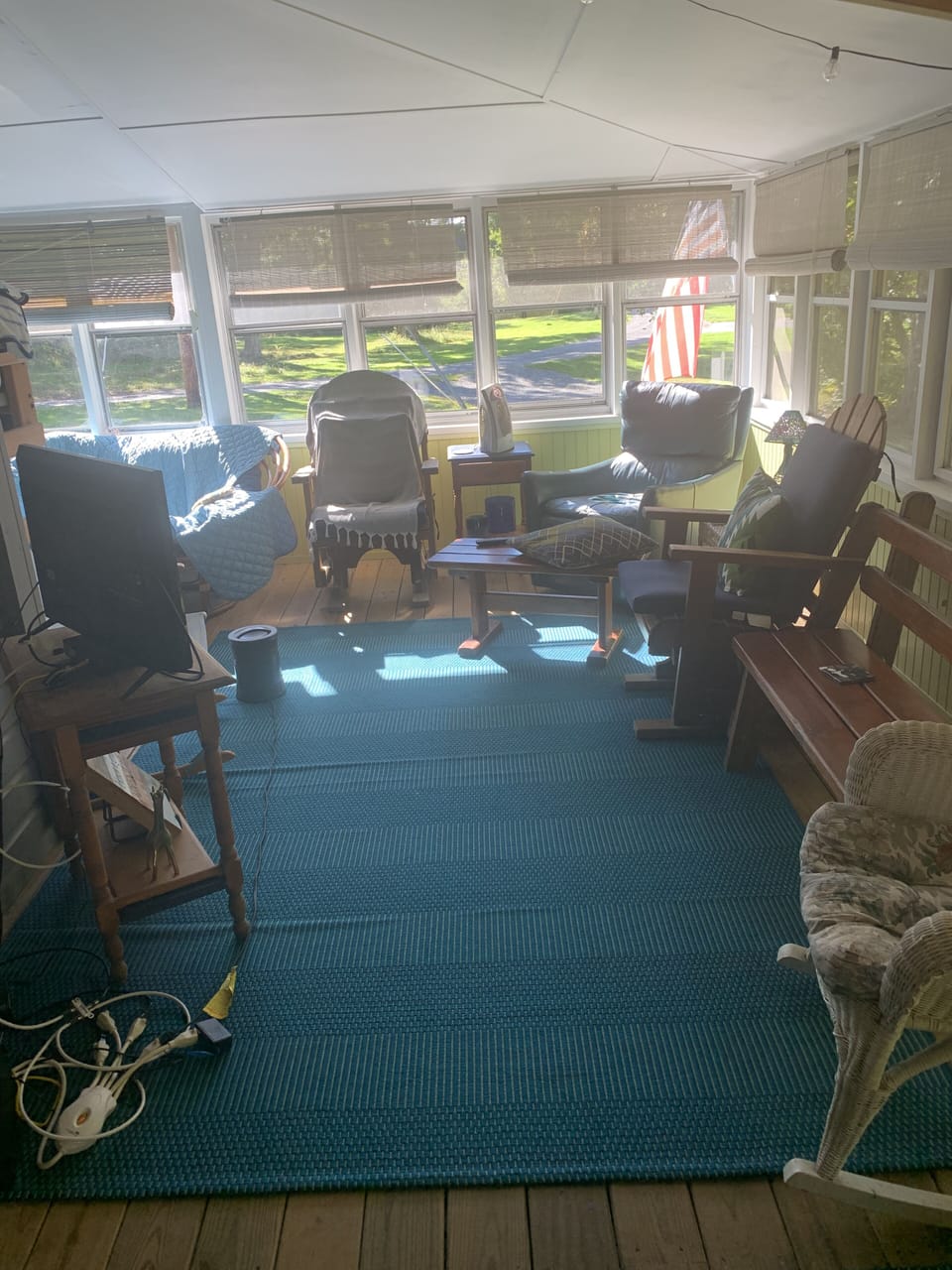 Spacious side porch offers ample seating!