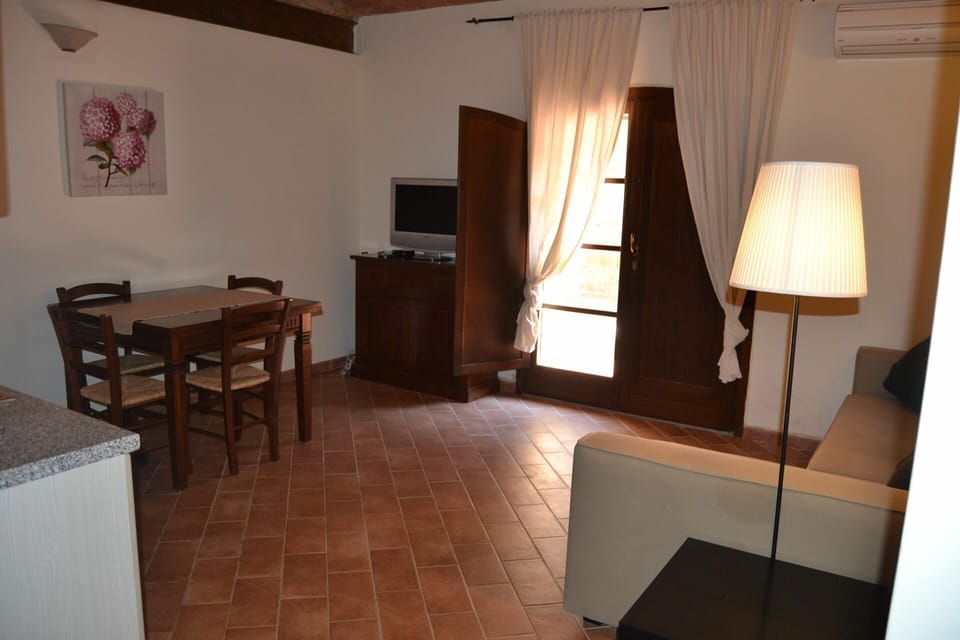 Furniture, Table, Property, Building, Curtain, Wood, Lighting, Comfort, Lamp, House