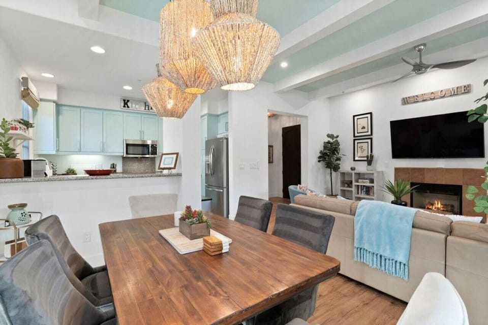 Open concept living with dining table for 6