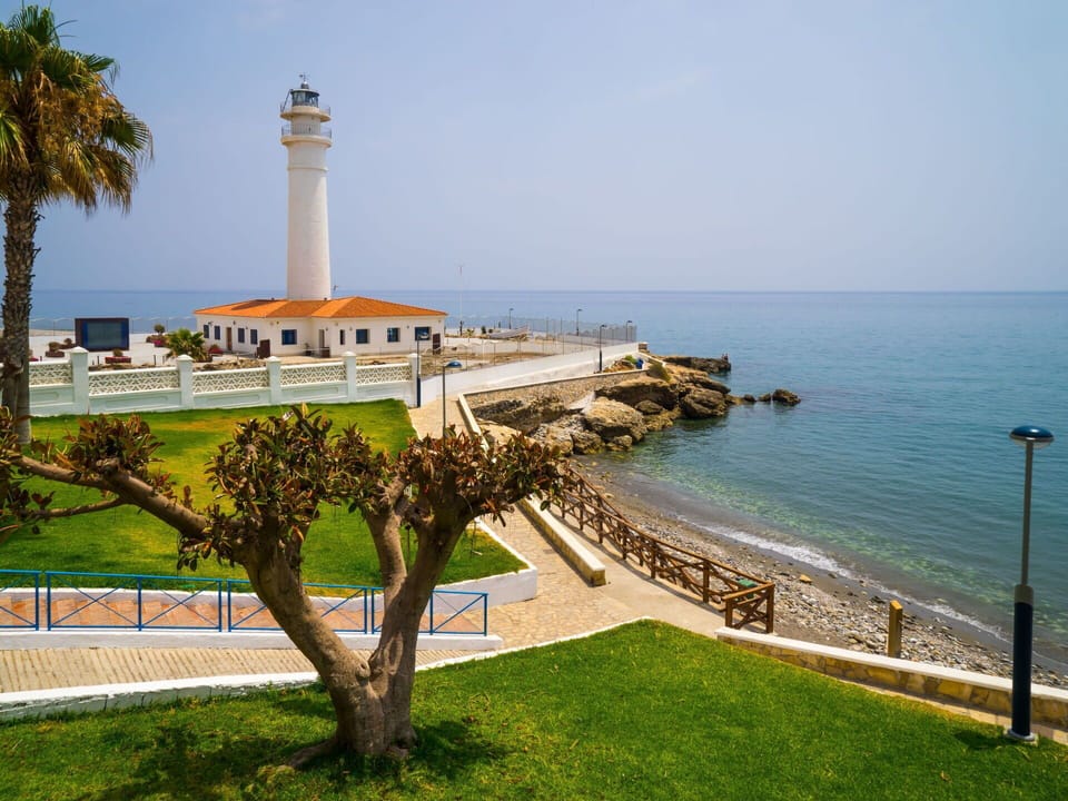 Water, Sky, Plant, Tower, Tree, Building, Coastal And Oceanic Landforms, Arecales, Leisure