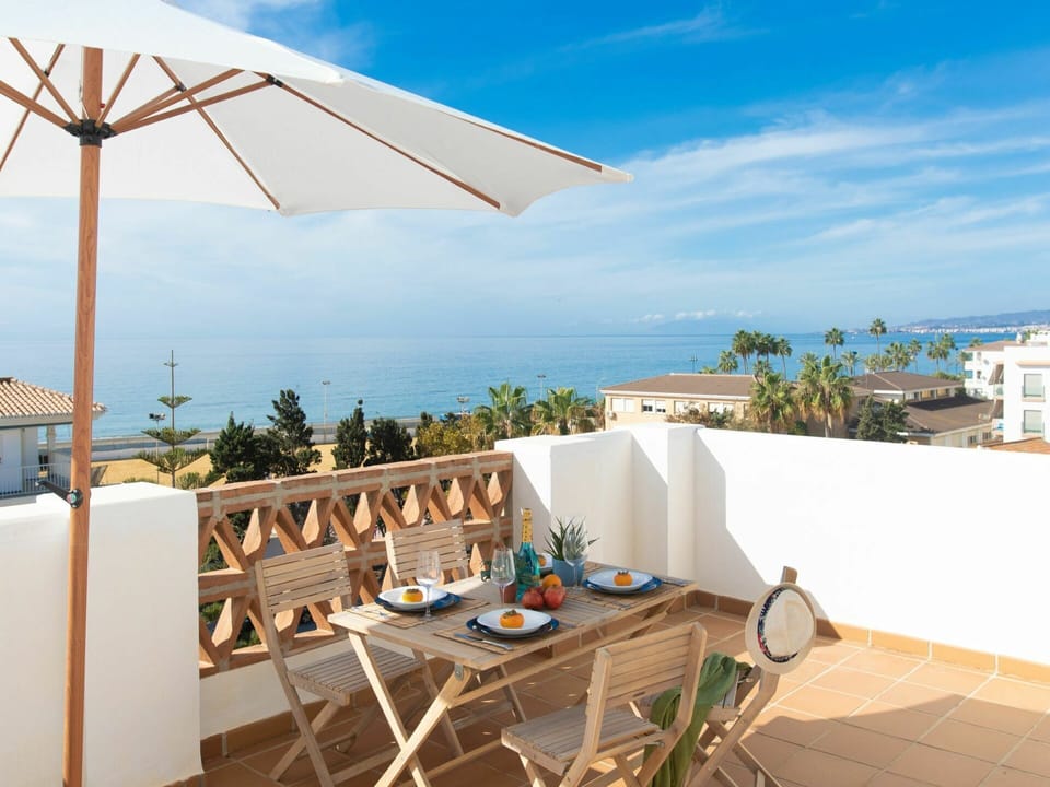 Sky, Cloud, Table, Property, Building, Azure, Plant, Chair, Shade, Seaside Resort