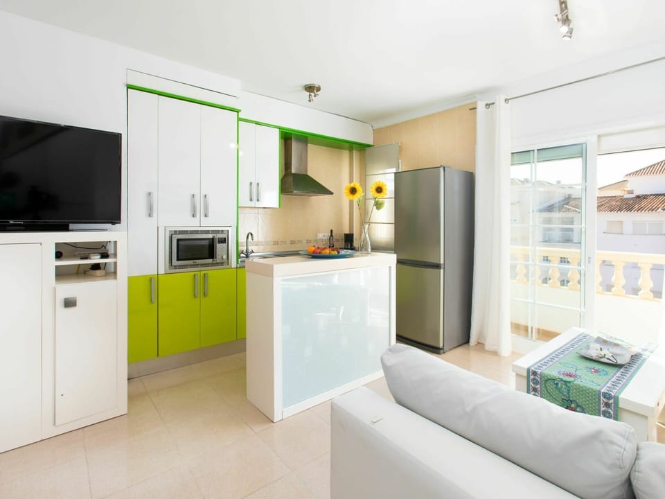 Cabinetry, Property, Furniture, Home Appliance, Countertop, Couch, Building, Kitchen Stove, Interior Design, Flooring