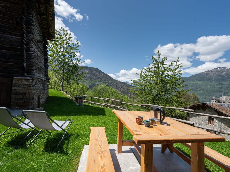 Cloud, Sky, Plant, Furniture, Property, Table, Nature, Mountain, Natural Landscape, Building
