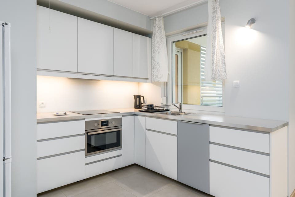 The fully equipped kitchenette includes everything you need for a home-cooked meal.