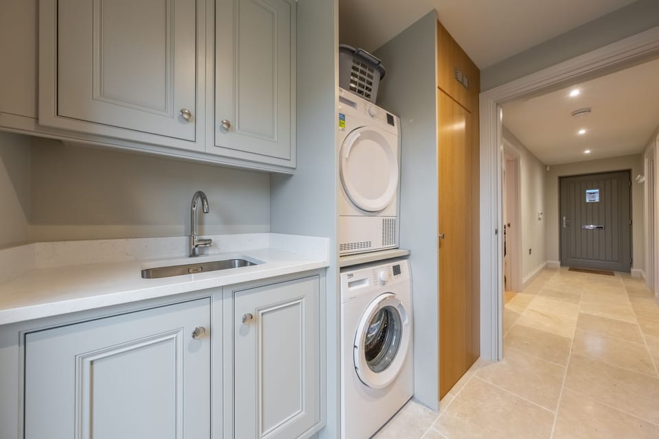 Ground floor: Utility with washing machine and dryer