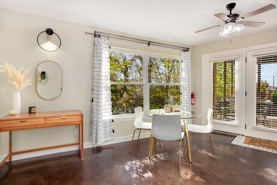 Between the two spaces, find our 4-top dining table.