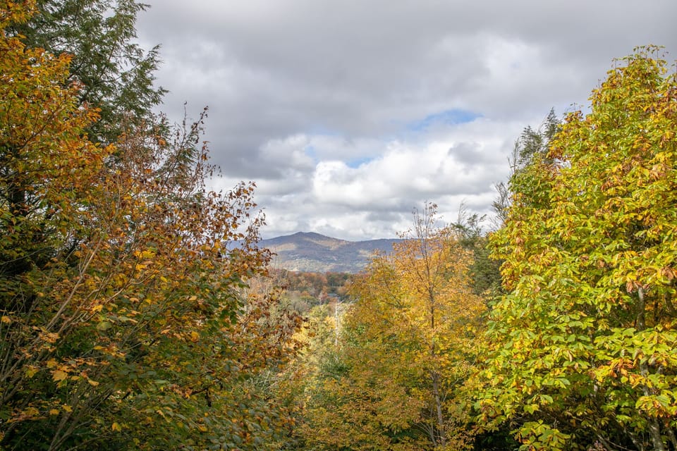 Views from Skyleaf, showing off Layered Mountaintops, and Fall Leaf Colors