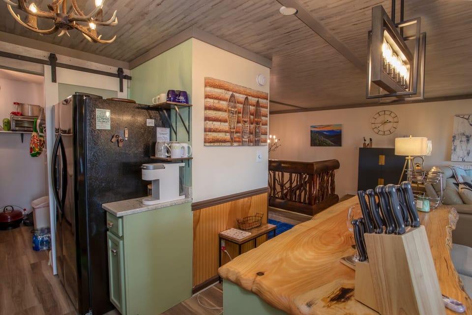 Kitchen is open to Living and Dining Rooms