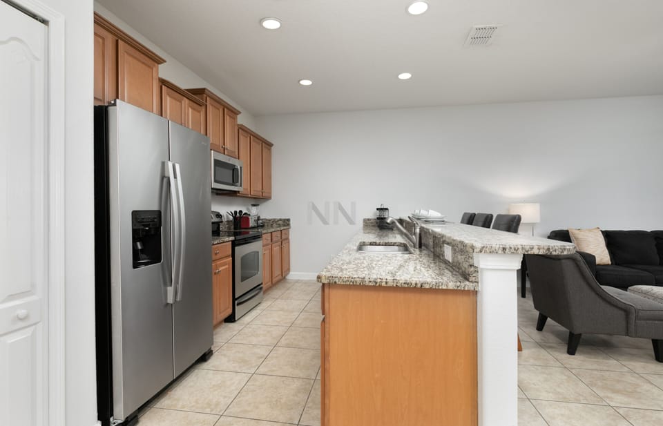 Enjoy cooking in our well-equipped kitchen with two sinks.