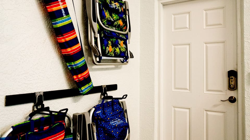 Beach chairs, beach umbrella, cooler and beach cart