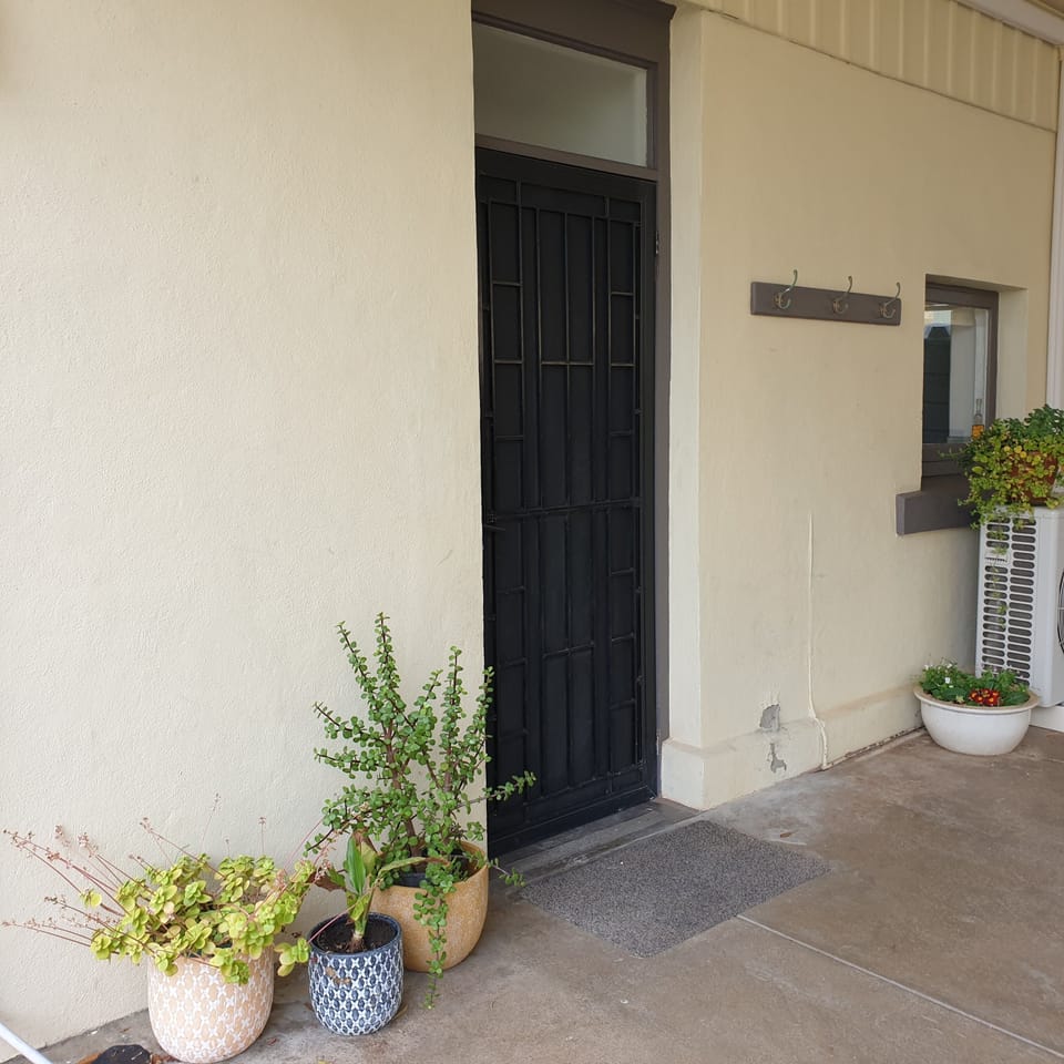 Main Entrance at side of house