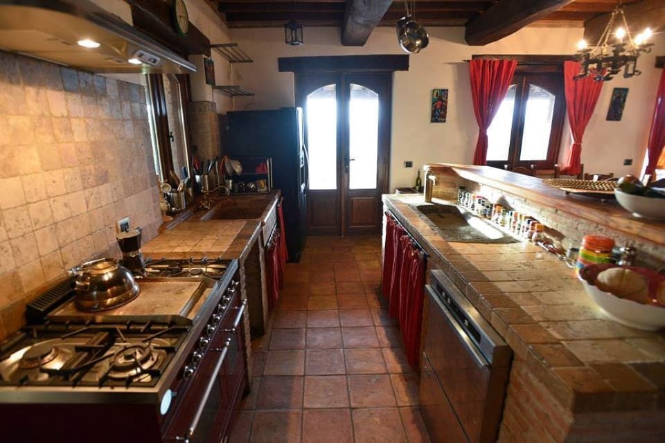 Kitchen with industrial dishwasher.