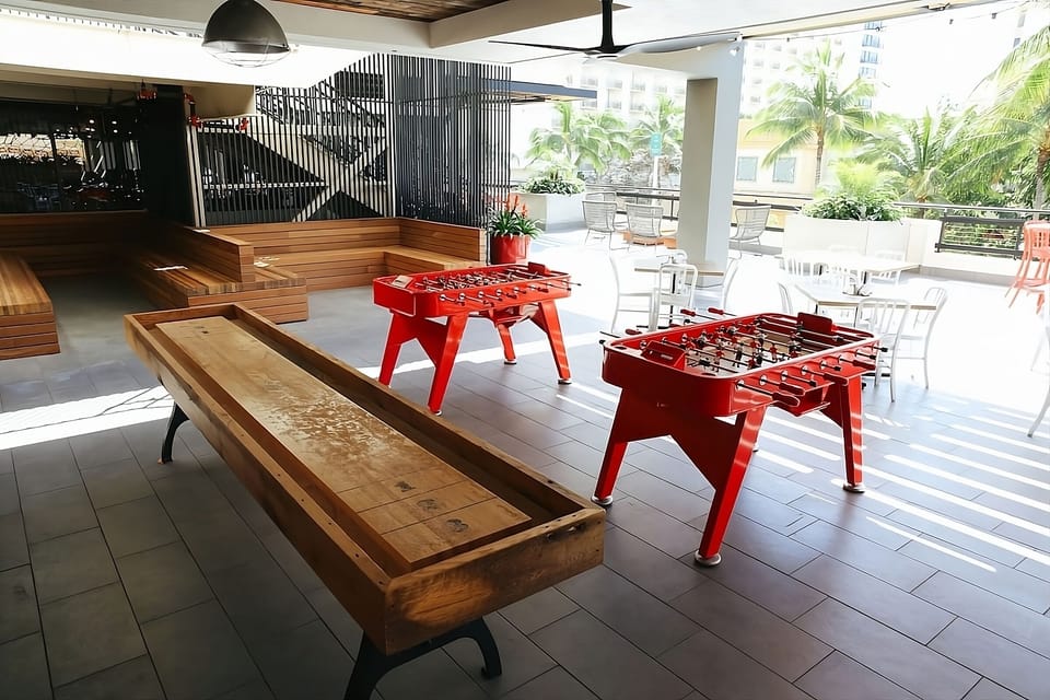 Unwind outdoors with games, sunshine, and breezy tropical views.