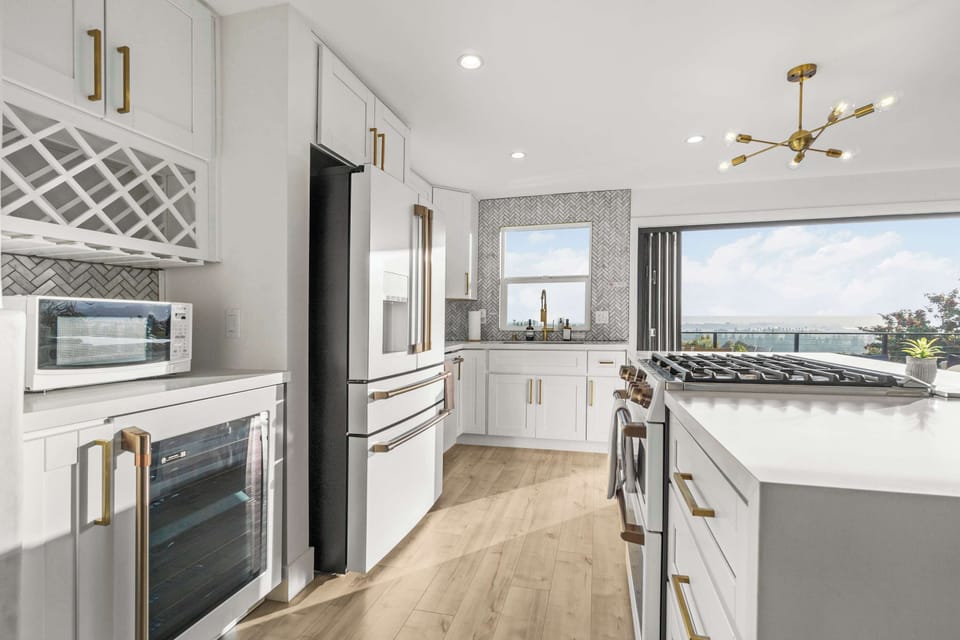 Kitchen | Fridge | Stovetop Oven | Wine Fridge | Dishwasher
