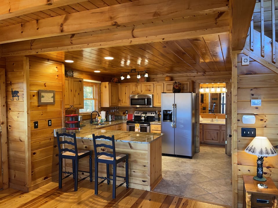 Gourmet Kitchen with granite countertops & stainless steel appliances