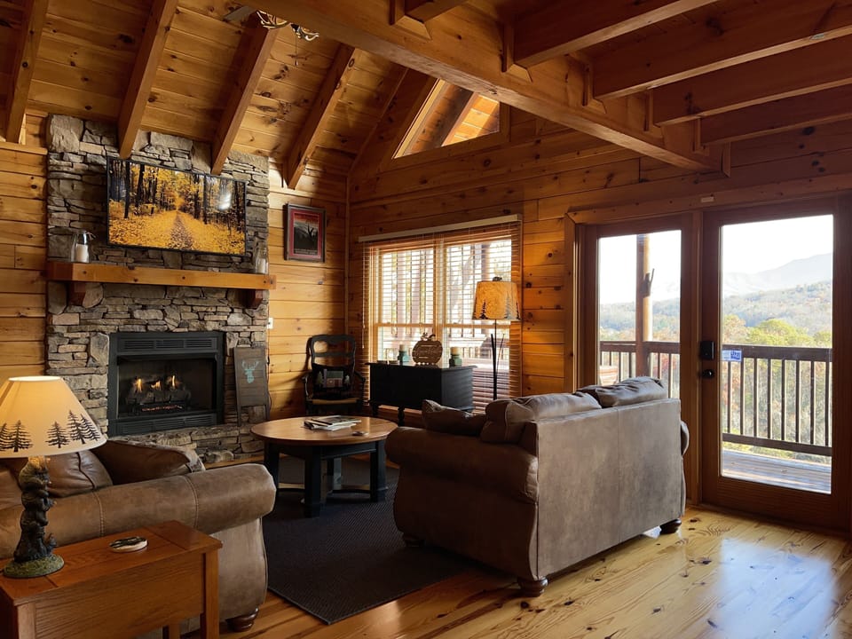 Great Room with gas fireplace and 180 degree view of the Great Smoky Mountains