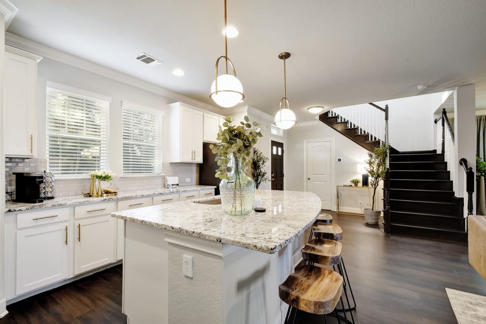 Open kitchen with plenty of room to have all the family around.