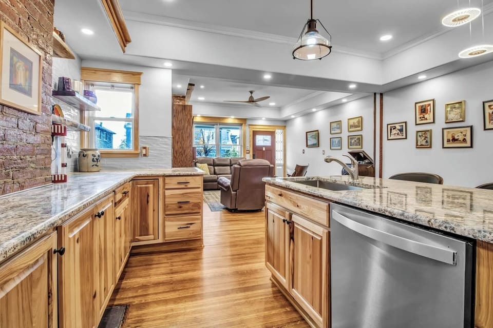 Seamless transitions: Our kitchen flows effortlessly into the cozy living area.