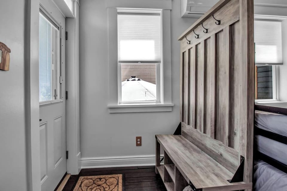 Private entrance with a coat rack and storage for your use!