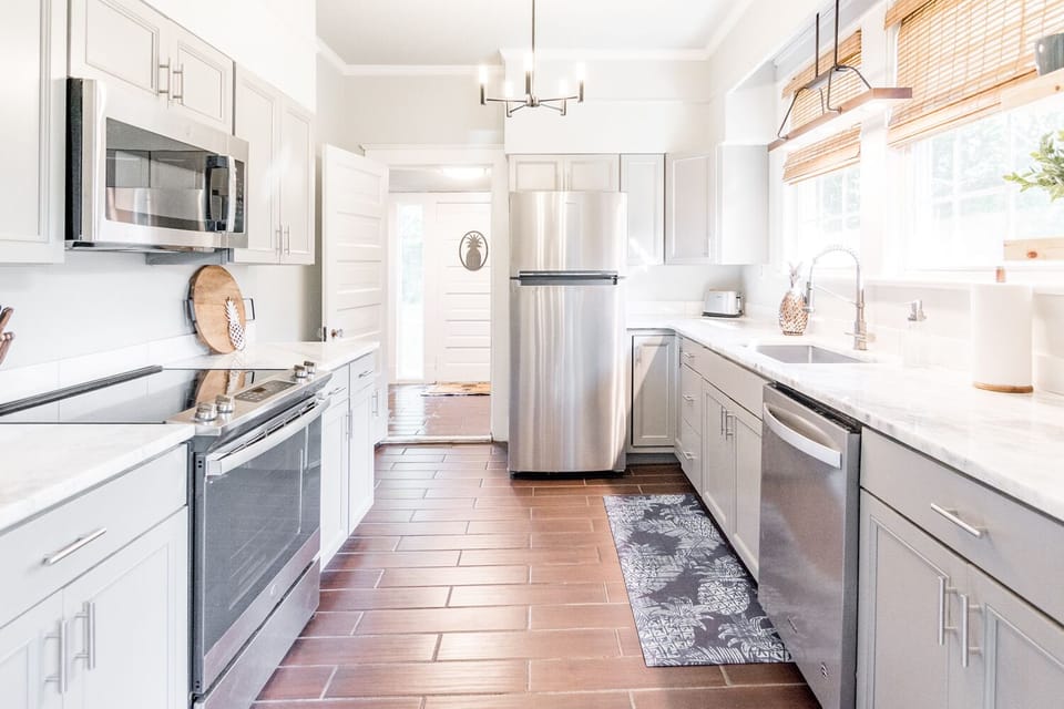 Stainless fridge, oven/stove, dishwasher, microwave, pots/pans, etc.
