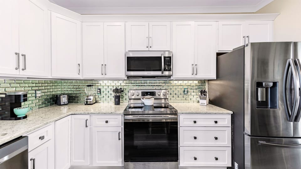 Our open kitchen is fully-equipped.