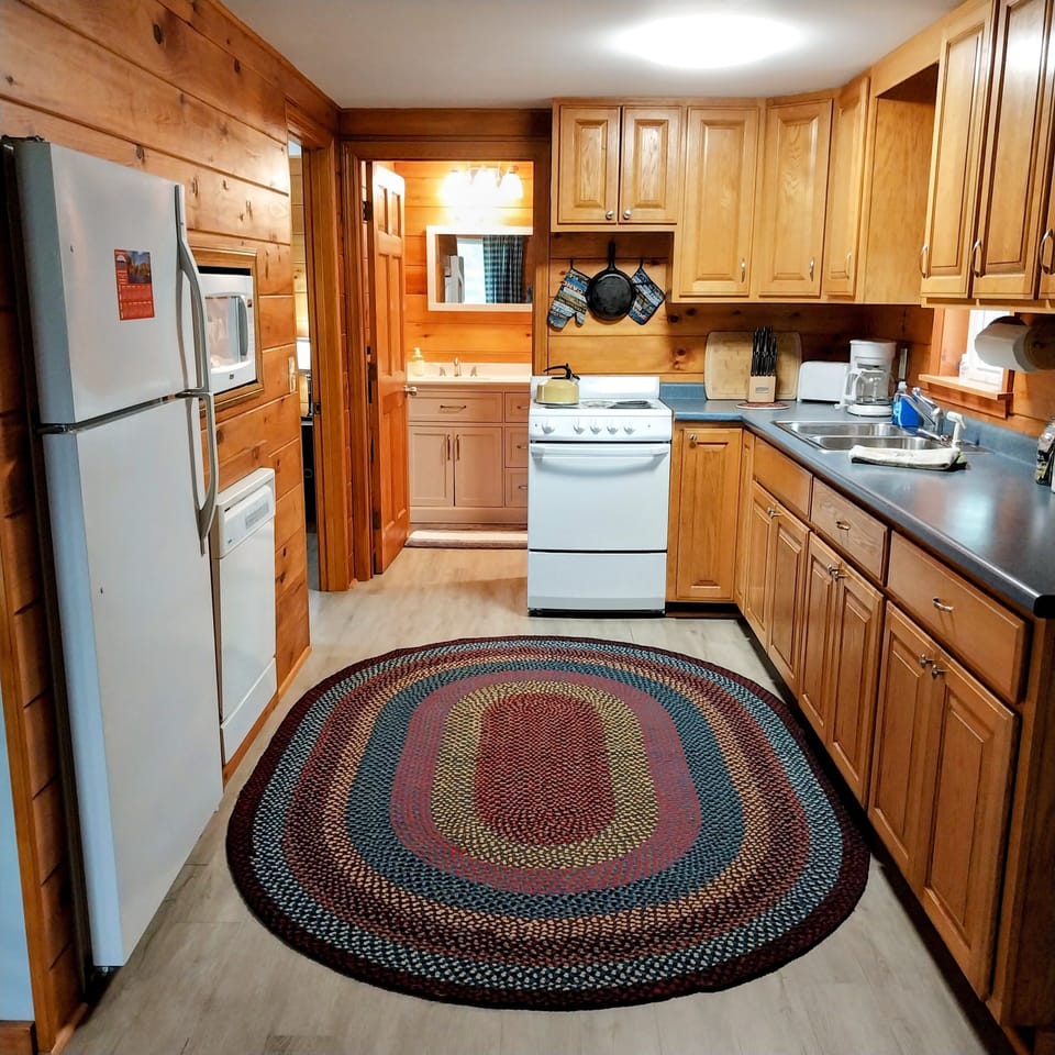 Open concept kitchen. It is equipped just right for creating a perfect meal.