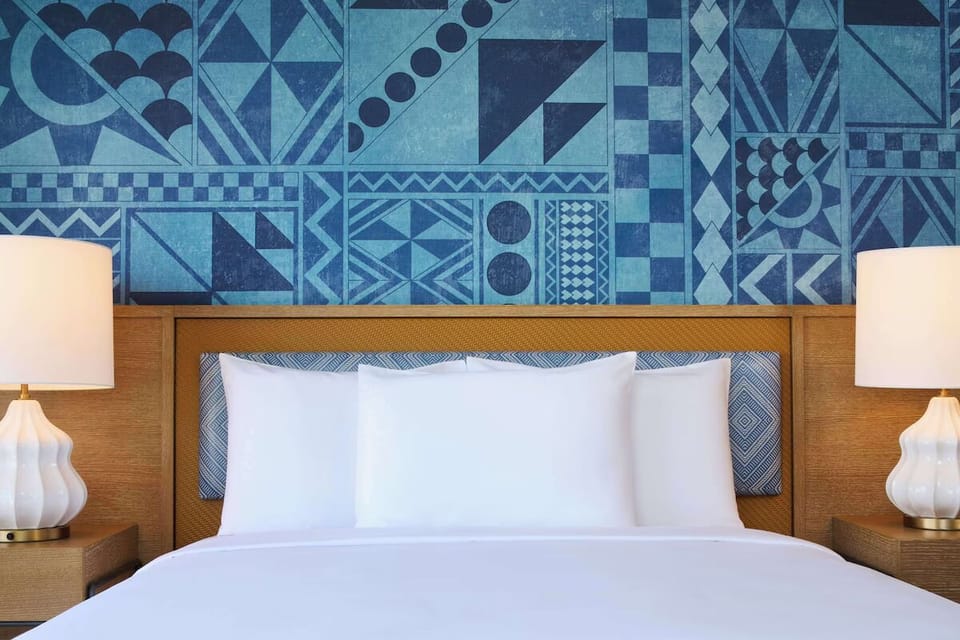 Admire bold island-inspired design before sinking into soft pillows.