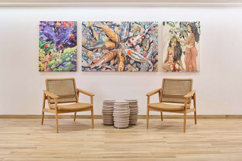 Pause and recharge beside curated art in calm seating.