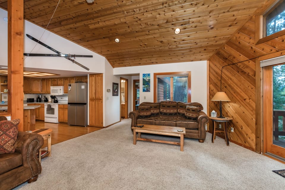 Living Area Showing Hallway To Shared Bathroom & Master Bedroom