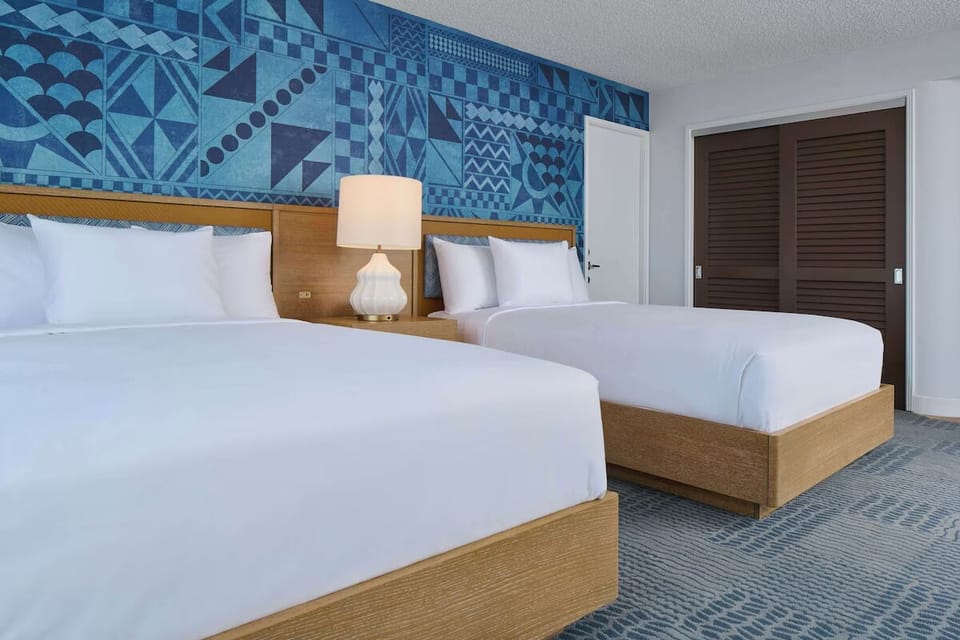 Enjoy a restful night in crisp beds and coastal style.