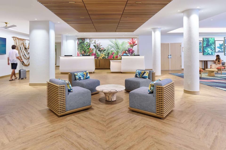 Settle in with airy lounge seating and tropical vibes.
