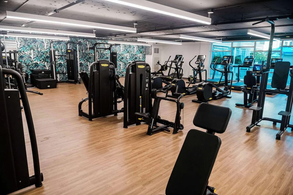 Energize your day in a bright gym with modern equipment.