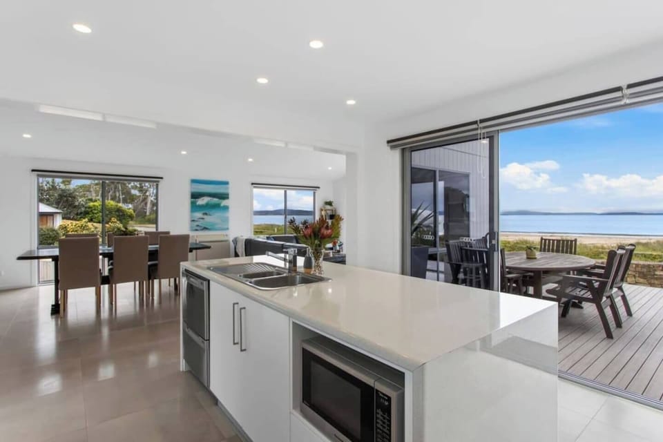 Cook up a storm in the gourmet kitchen, fully equipped with modern appliances and ample counter space.