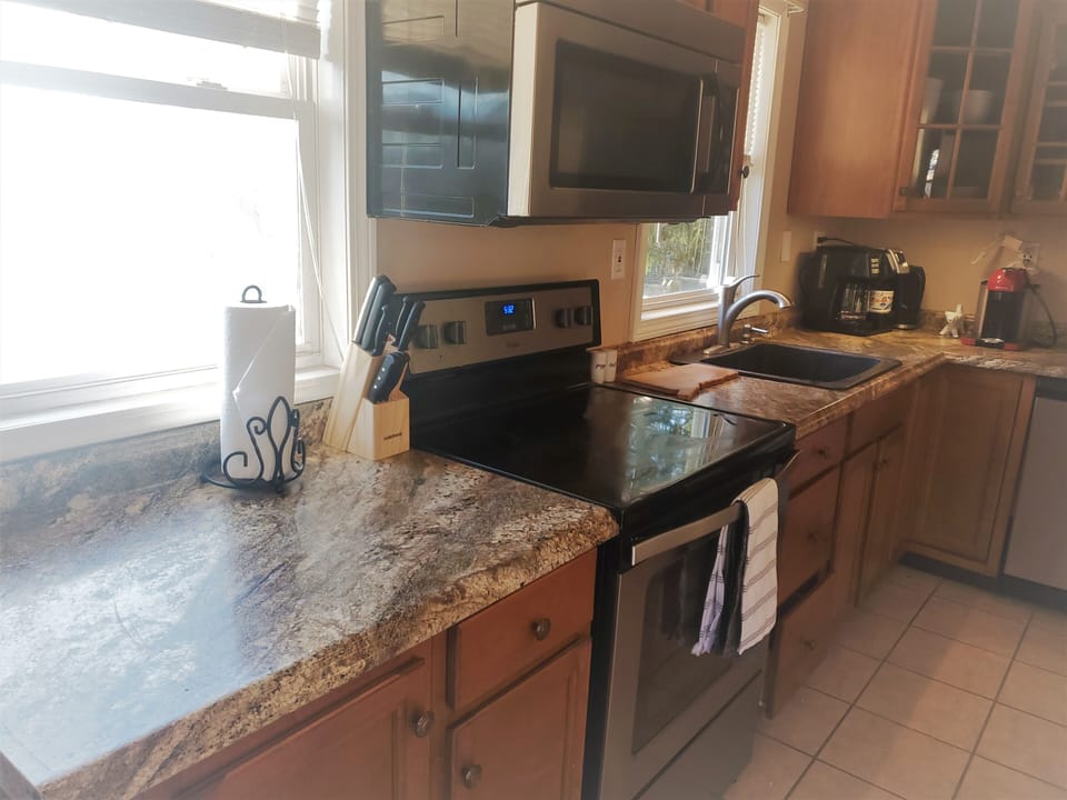 fully stocked kitchen with a view