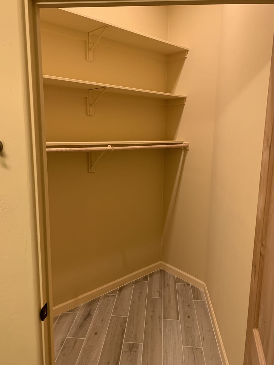 Large closet adjacent to bathroom. Armoire, spare sheets, and vacuum included.