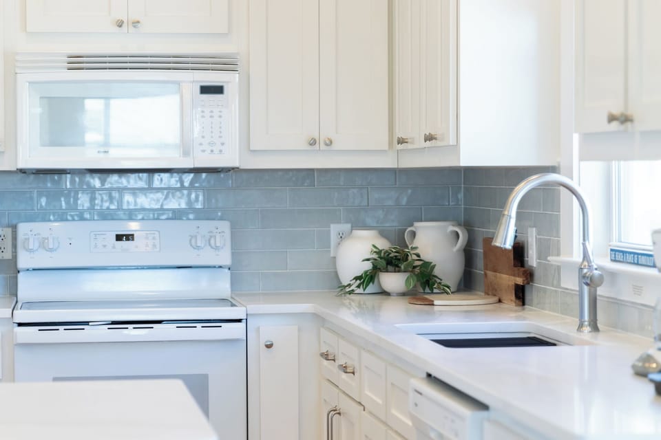 Recently updated kitchen with new backsplash and countertops