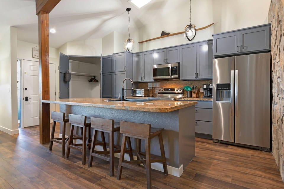 Kitchen features a "hidden" mud room for coat, ski and boot storage!
