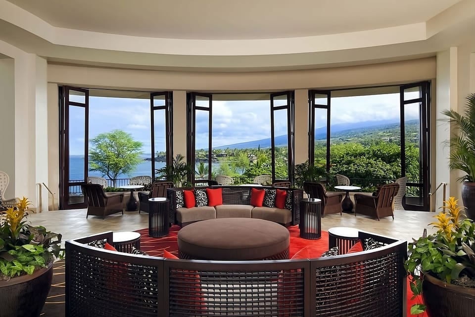 Unwind in a panoramic lounge with breezy open-air views.