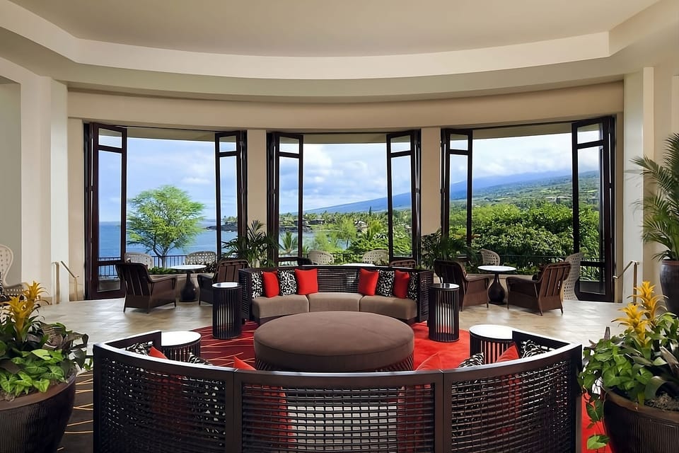 Unwind in a panoramic lounge with breezy open-air views.