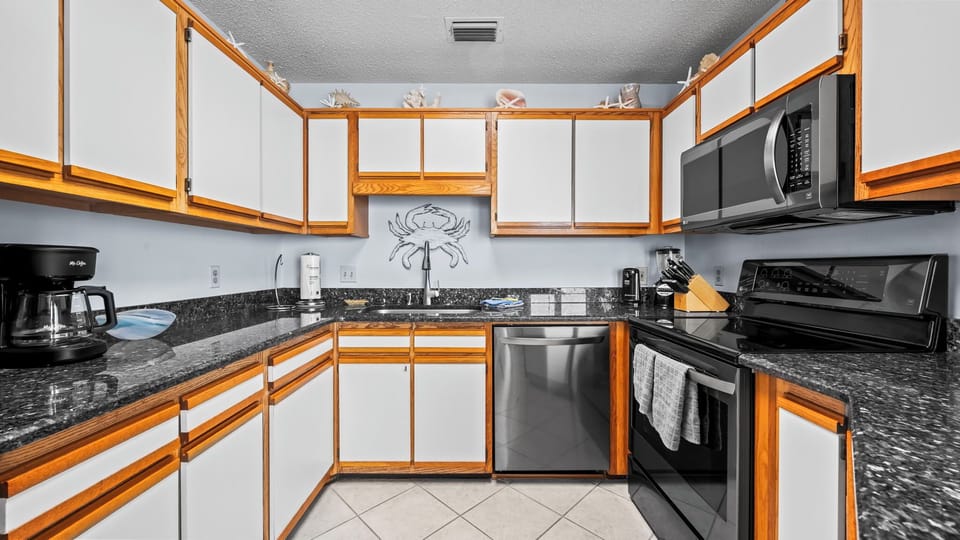 Embrace culinary creativity in the charming kitchen, where every meal becomes a delightful family experience