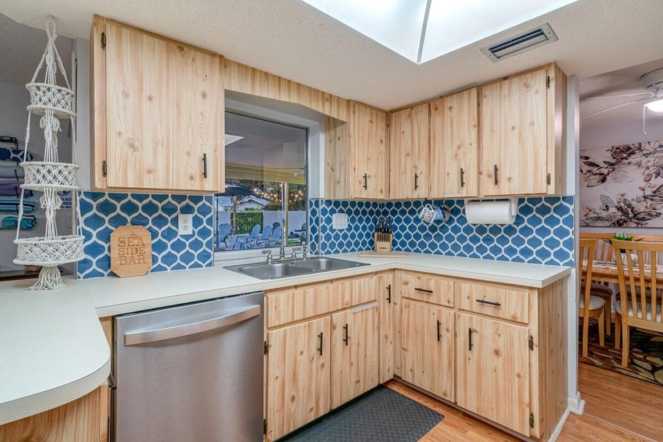 View of pool/yard as you cook