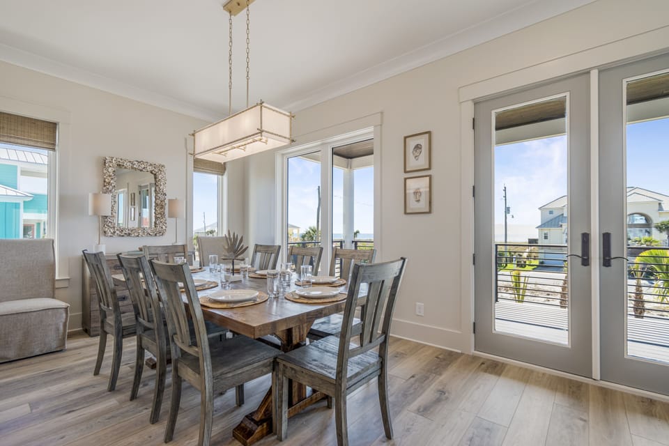 French doors lead out to the Gulf view balcony