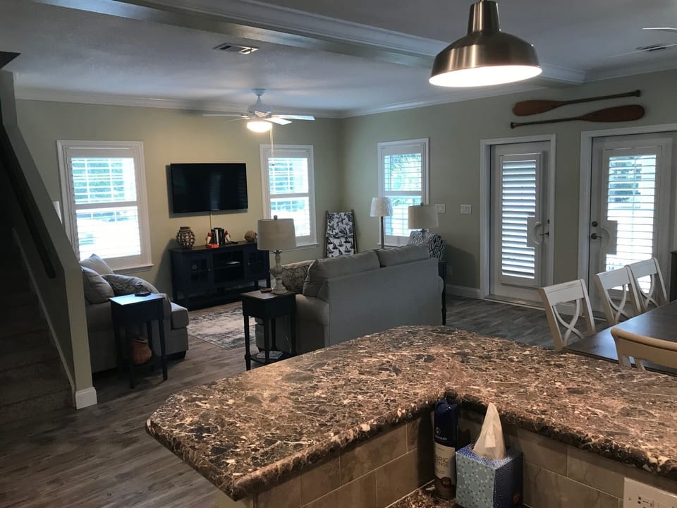 living room and dining room looking from kitchen