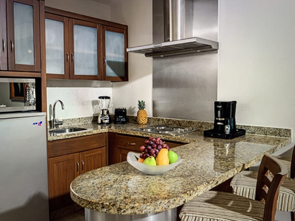 Fully equipped kitchen, microwave, blender, coffee maker, dishes, table settings