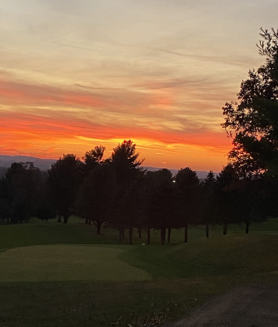 Beautiful sunset with #3 green. 
The cart path going to #16 tee box