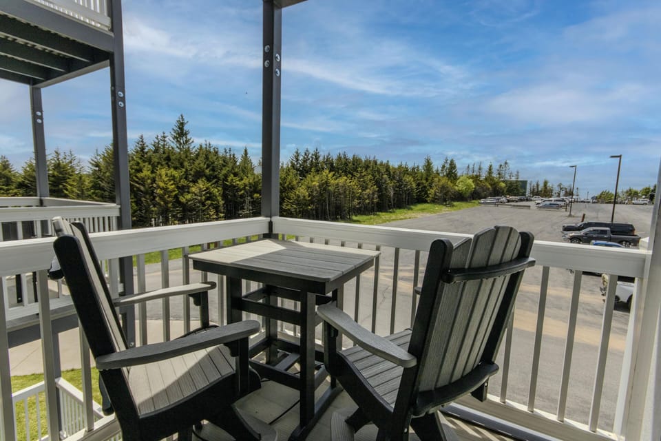 Enjoy the 7' x 7' galvanized steel deck with seating for two!
