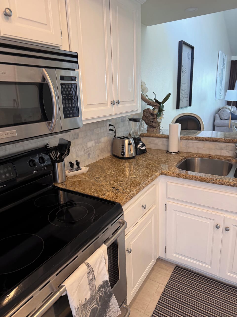 Kitchen oven and microwave and stove top
