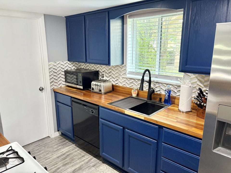 Beautiful blue cabinetry in the kitchen