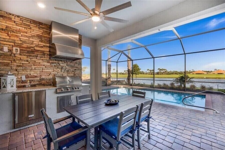Enjoy outdoor dining by the sparkling pool